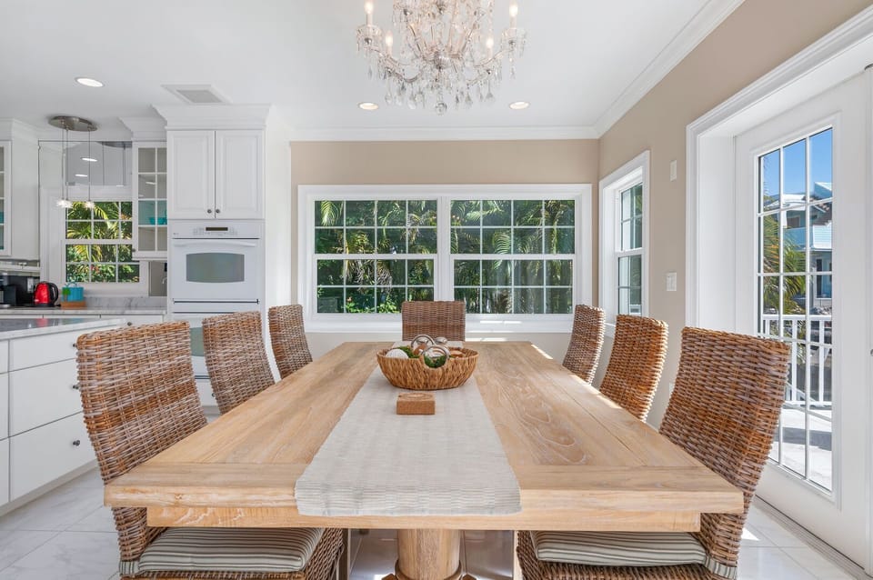 Large wooden dining room table with seating for 8
