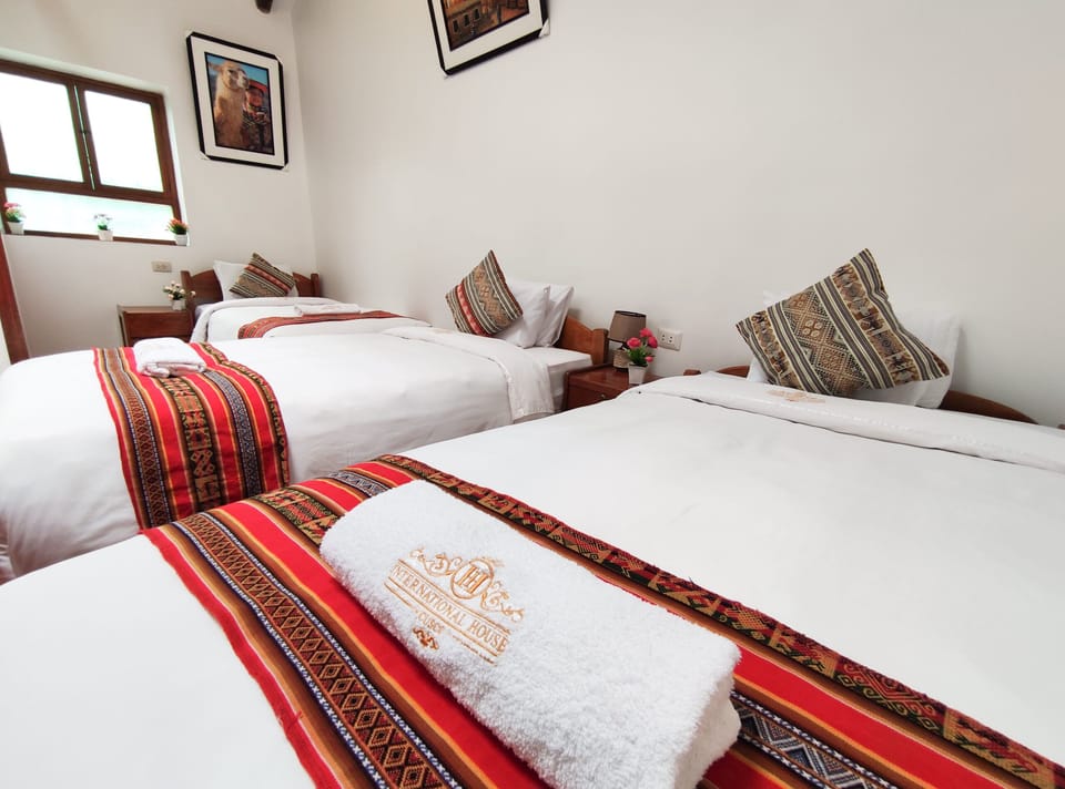 Triple Room | Down comforters, Select Comfort beds, individually decorated