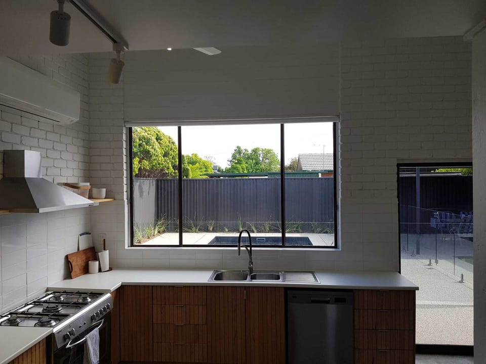 Full Kitchen overlooking Pool/Back Yard