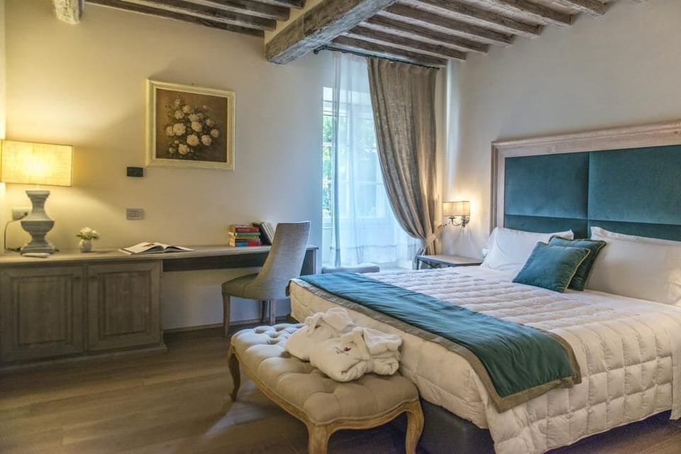 Junior Suite, Patio | In-room safe, blackout drapes, iron/ironing board, free WiFi