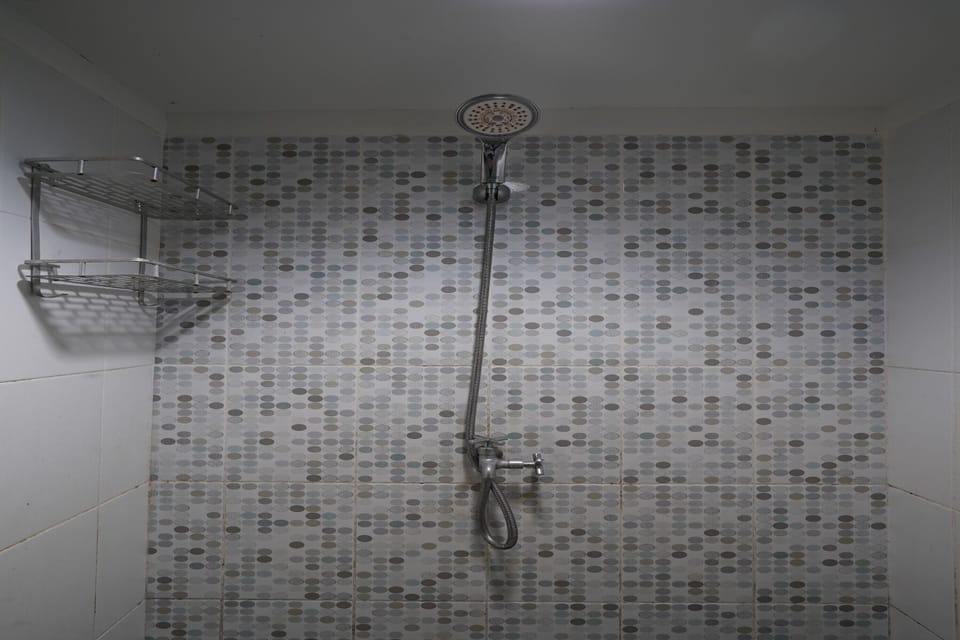 Family Suite | Bathroom | Shower, towels, soap