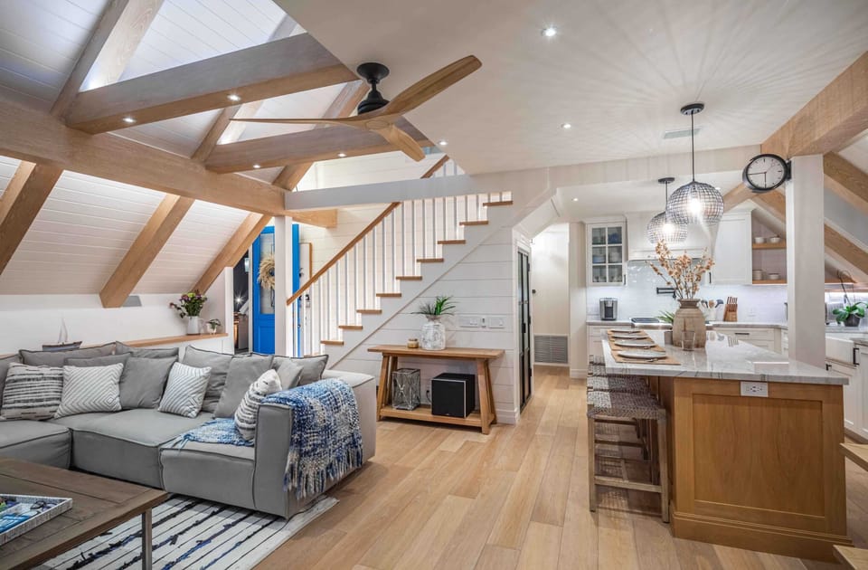 Decorated with modern fixtures and a comfortable sectional sofa.