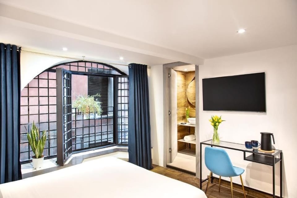 Classic Room | Down comforters, in-room safe, individually furnished, desk