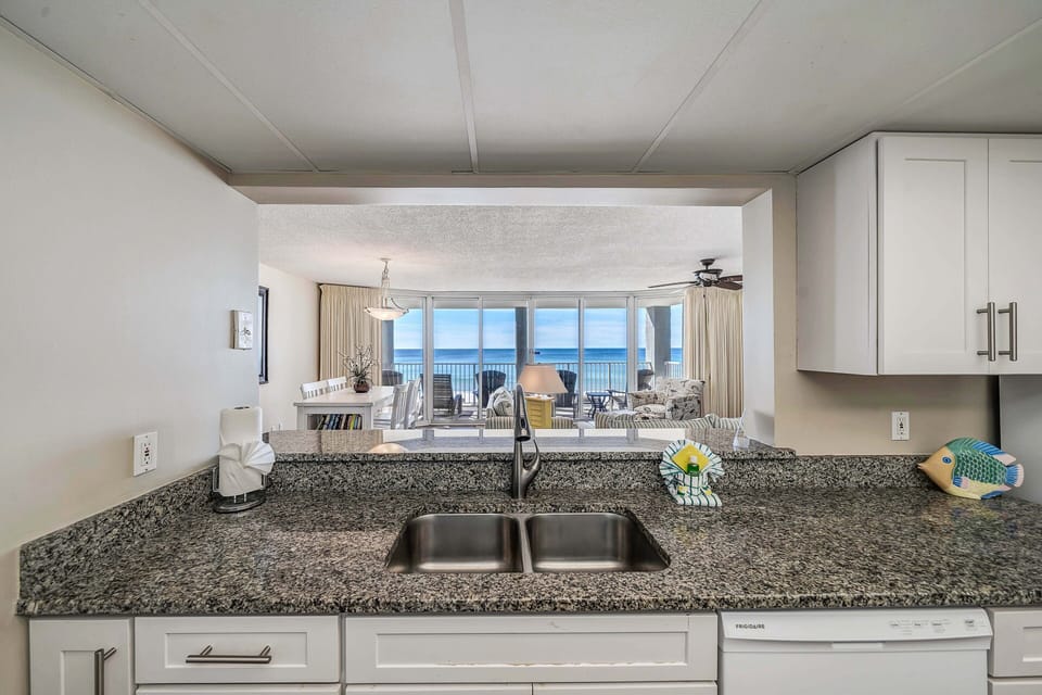 The fully equipped kitchen features granite countertops and has everything you need to prepare meals for family & friends.