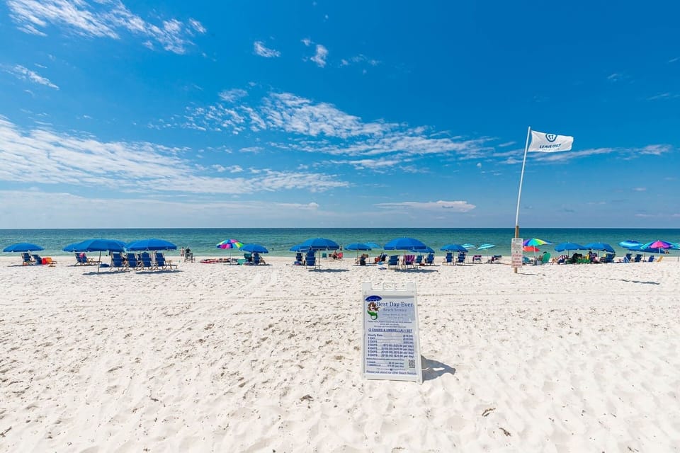 Relax on the soft sands with beach chairs and umbrellas, just steps away from the sparkling waters and vibrant beach scene