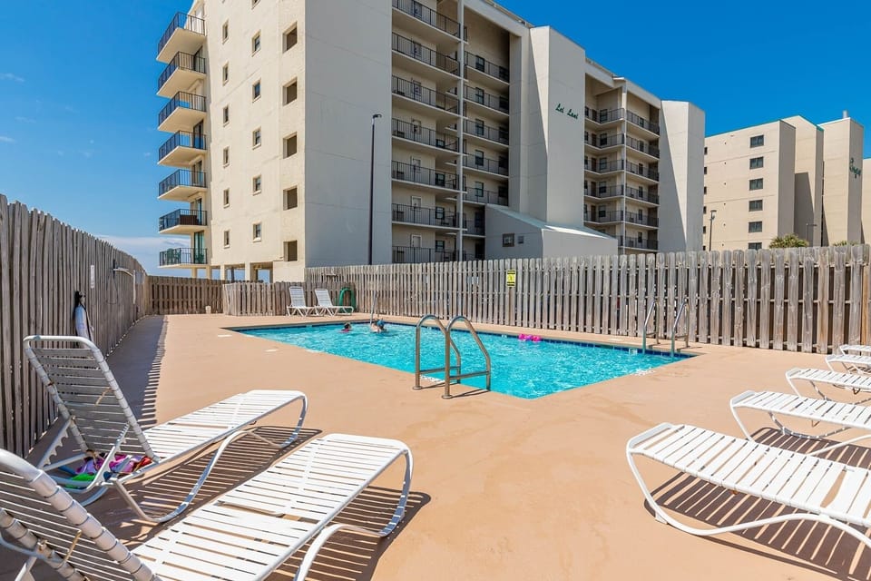 Relax by the poolside with easy beach access, perfect for family fun and sun-soaked days