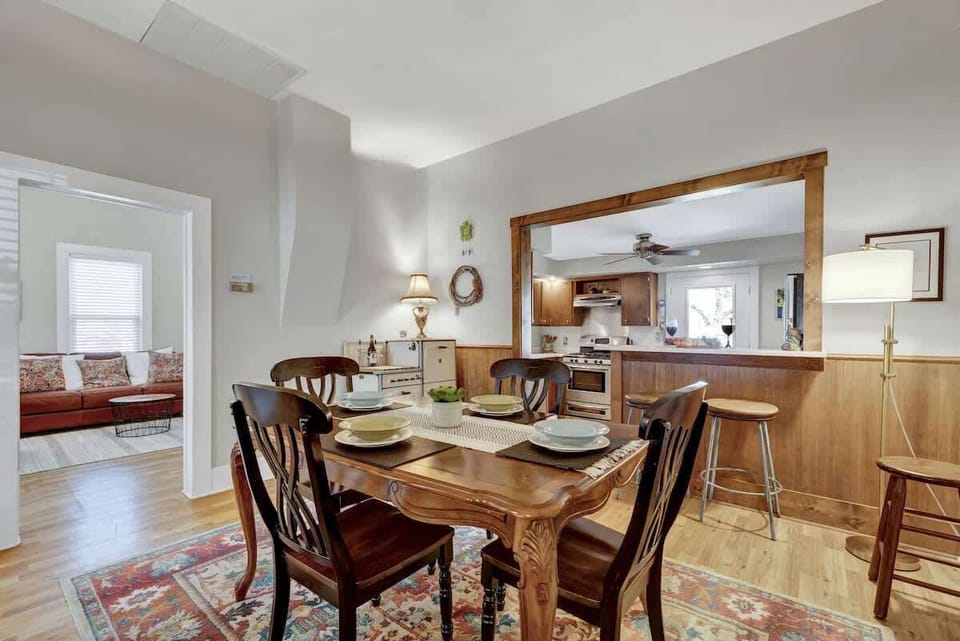 Dinner table for four plus bar seating for two.
