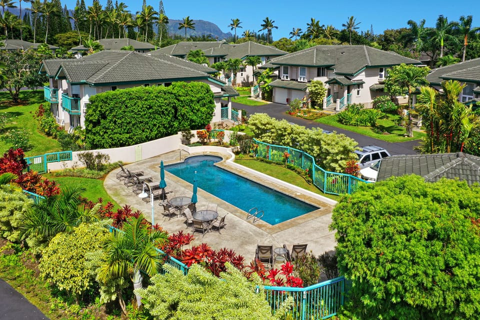 Community pool and BBQ area, steps from the condo.