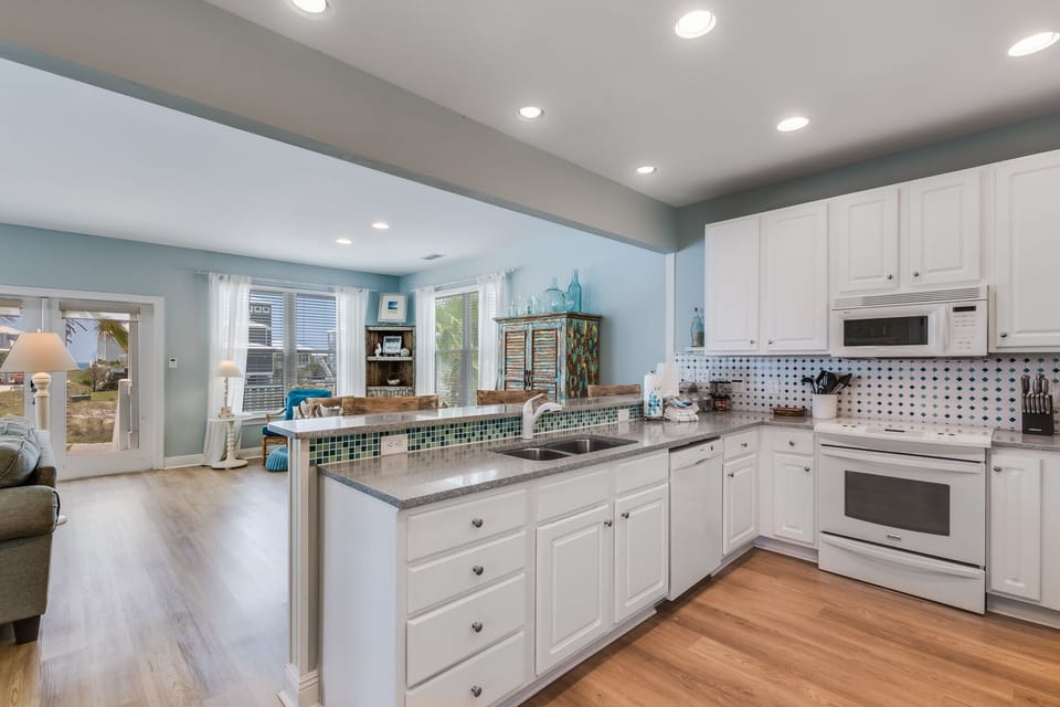 Whip up a meal for everyone in the large open kitchen, stocked with all the essentials.
