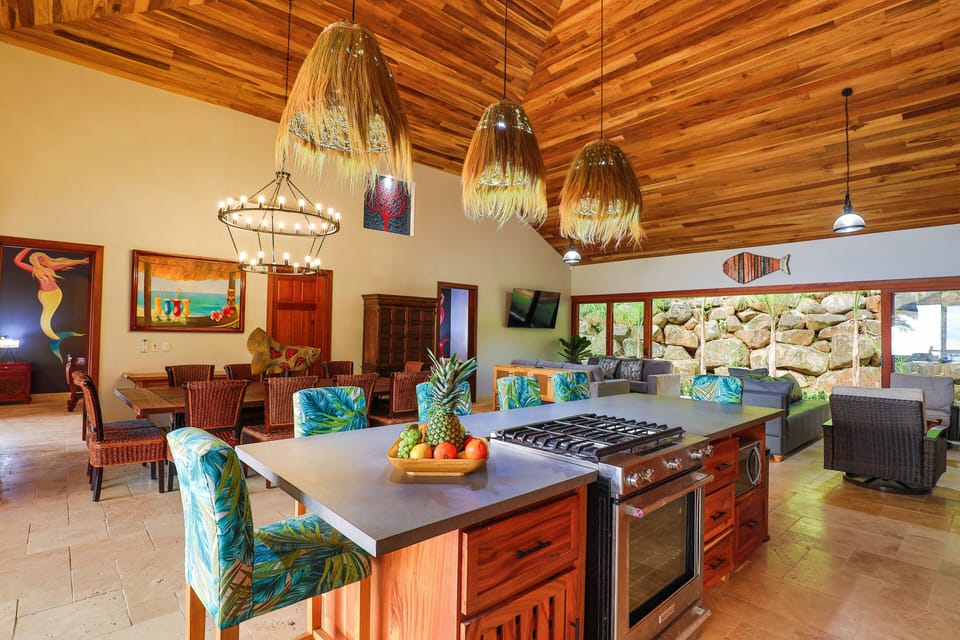 Seating for 18 at the dining table (12) and kitchen island (6)