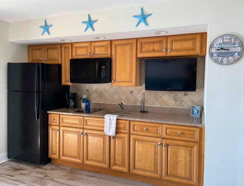 Kitchen ~ refridgerator, microwave, stovetop