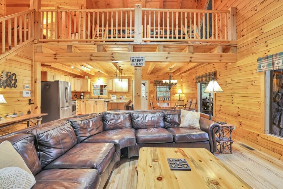 Comfortable, open dining room + living area so that the entire group can be together at once -- watching the game, playing cards, or snacking in the kitchen! 