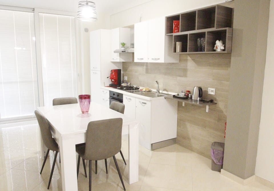 Family Quadruple Room, 1 Bedroom, City View | Living area