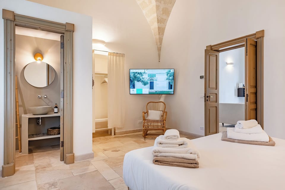 Grand Suite | Premium bedding, down comforters, individually decorated