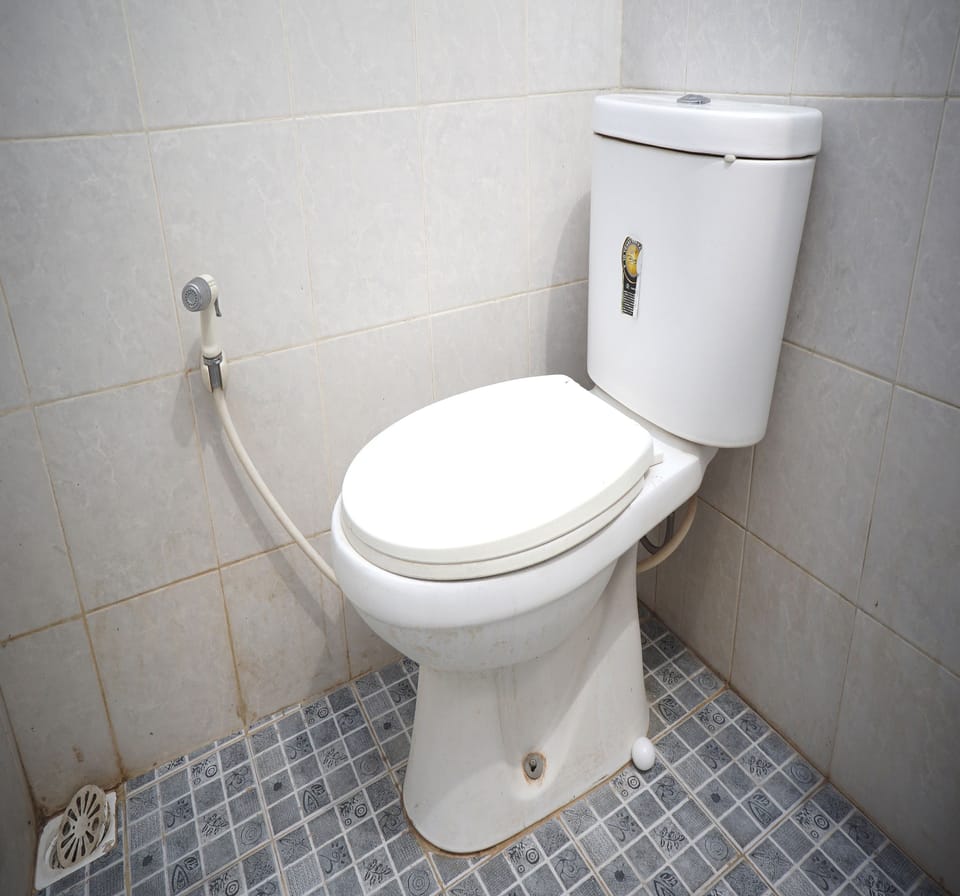 Basic Single Room | Bathroom | Shower, towels