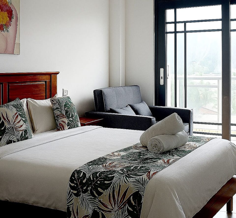 Superior Double Room | Living area | 40-inch flat-screen TV with digital channels