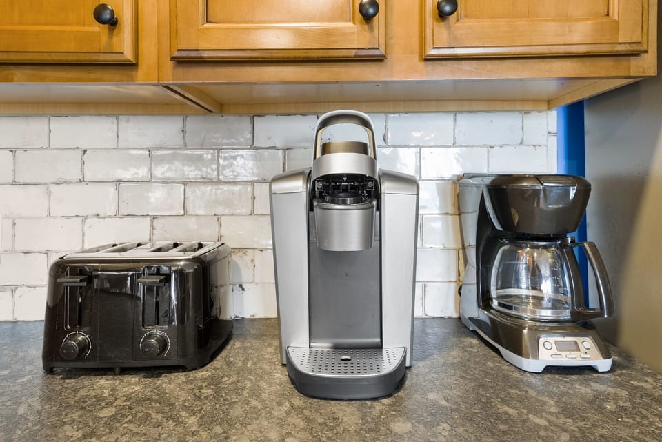 Start your morning perfectly with quality appliances - fresh coffee from the single-serve maker, golden toast, and everything you need for a great breakfast.