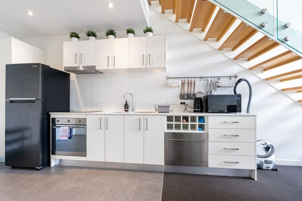 Enjoy a fresh and contemporary cooking experience in this beautifully modern kitchen.