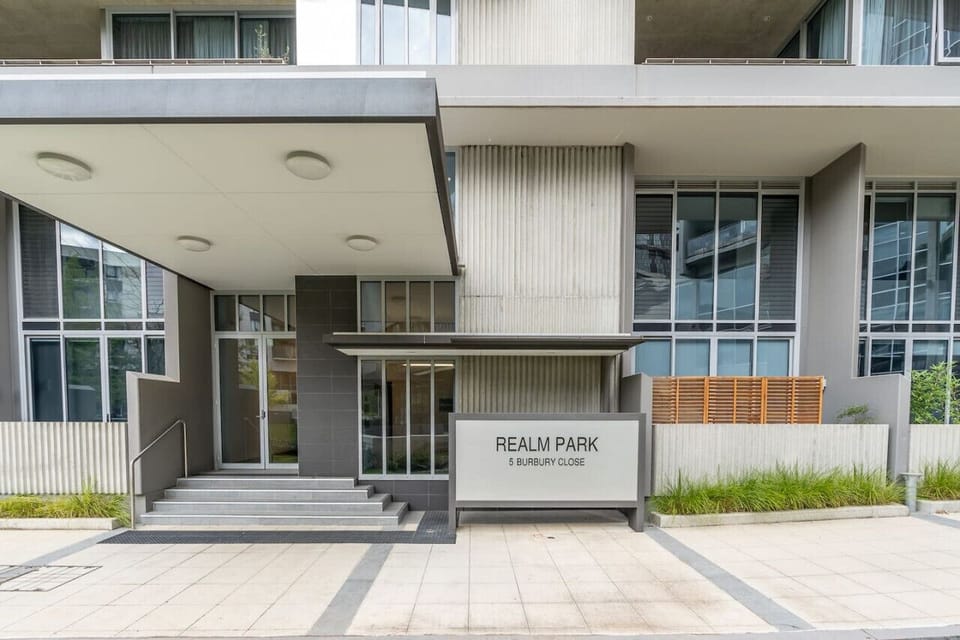Admire the striking building exterior, showcasing a blend of modern design and classic elements. The well-maintained façade and architectural details create an impressive and welcoming first impression.