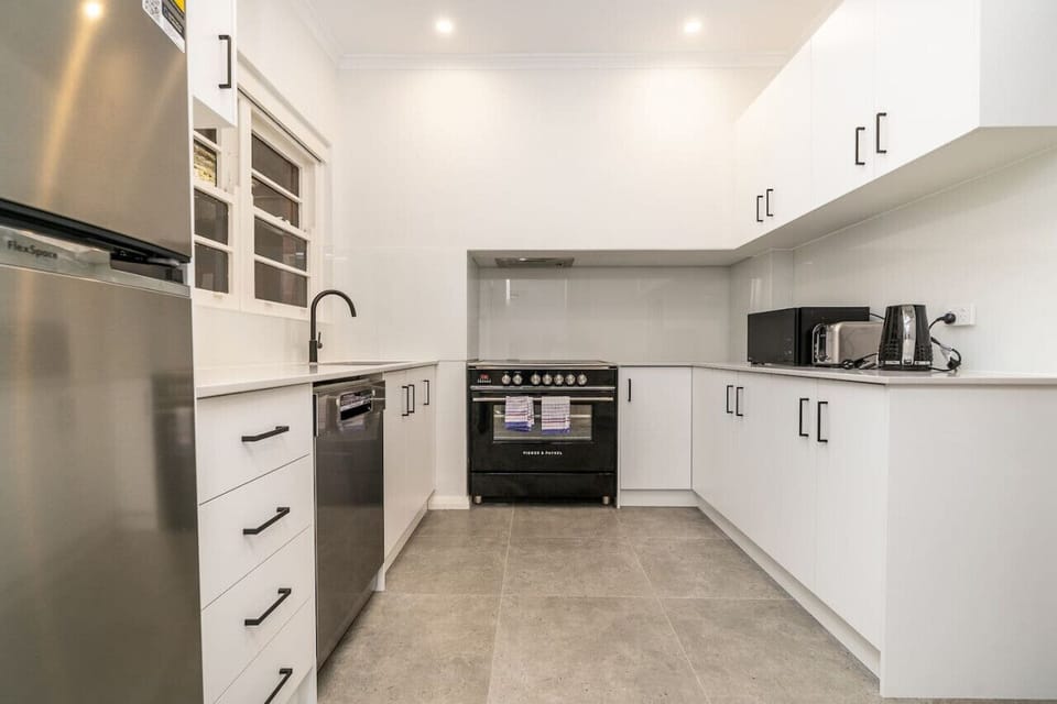 Stylish, renovated kitchen space featuring modern appliances and chic design for your culinary adventures.