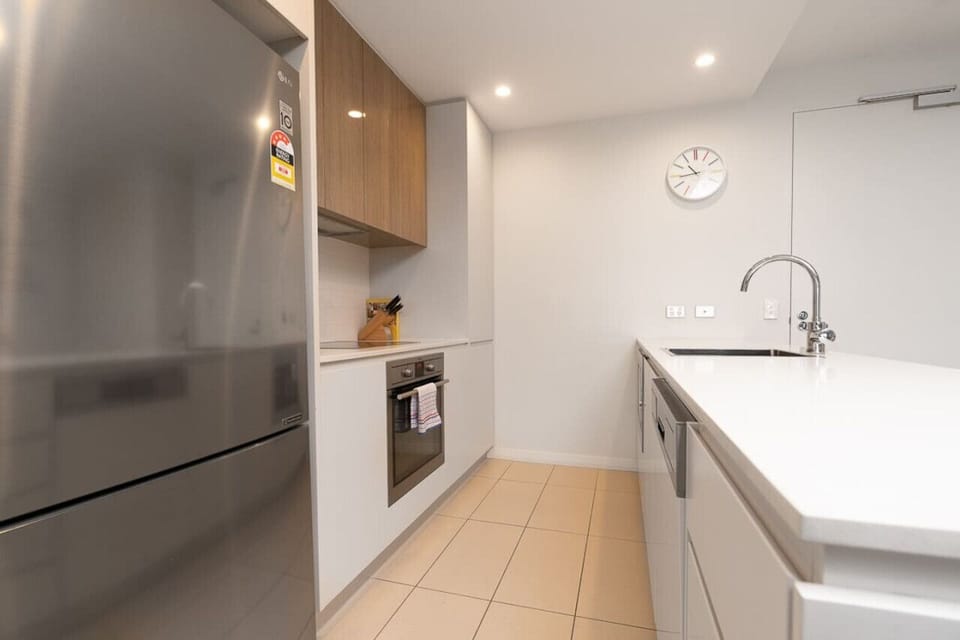 Step into our modern kitchen, where functionality meets style. Equipped with top-of-the-line appliances, ample counter space, and sleek cabinetry, it’s designed to make cooking and entertaining a pleasure.