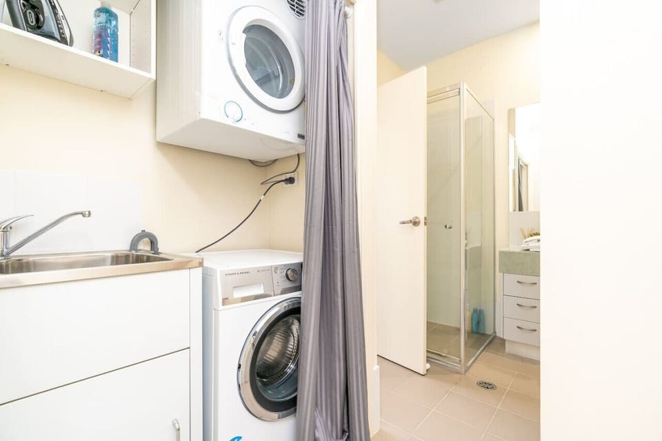 Very clean bathroom includes a bathtub, a shower, a sink, and a toilet.