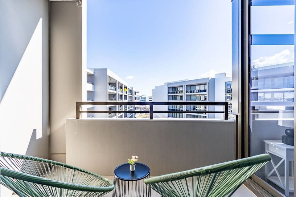 Experience couple`s relaxation on our charming balcony, offering seating for two that invites tranquility.