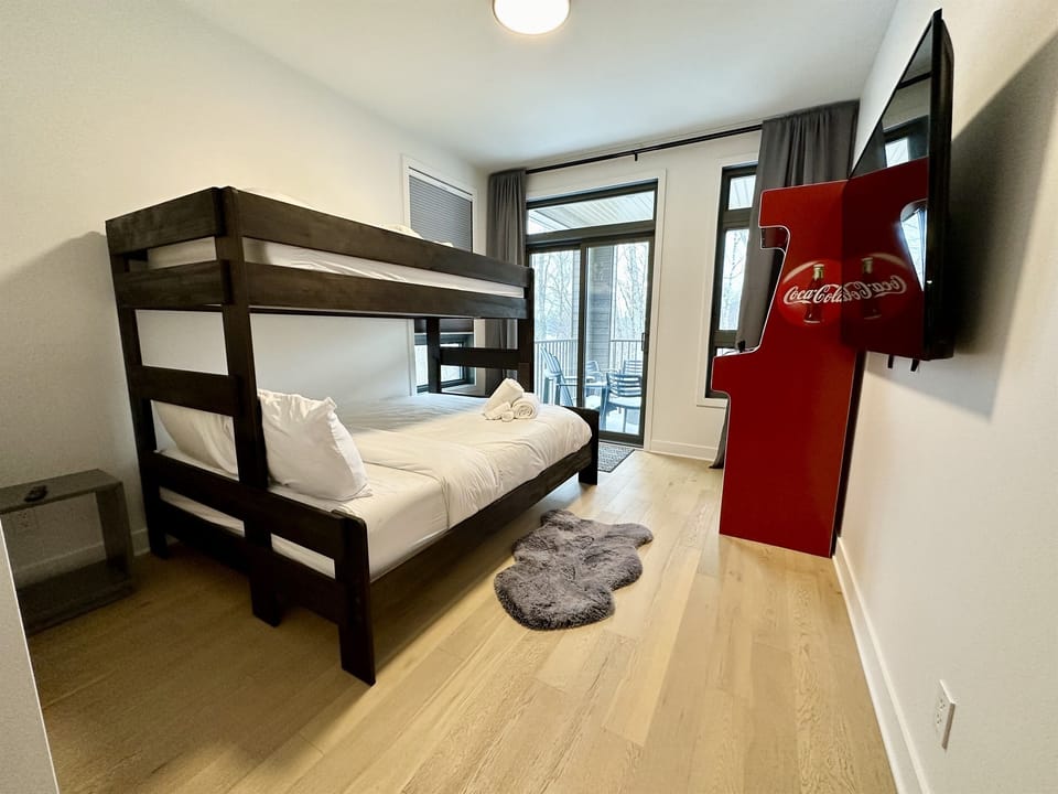 Balcony bedroom with full size Arcade 5000 games & 50"  Smart TV
