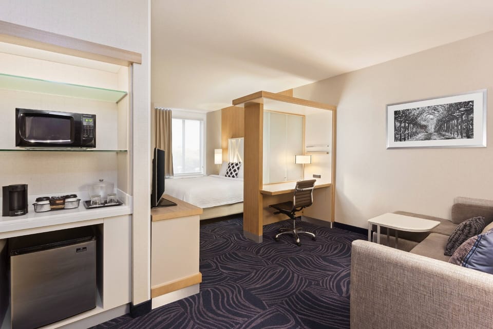 Premium bedding, pillowtop beds, desk, laptop workspace