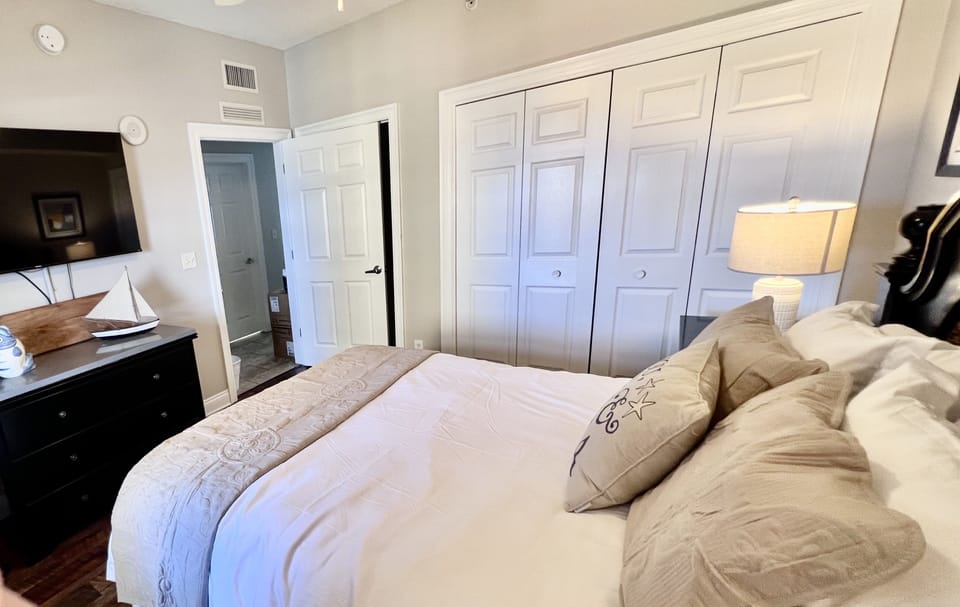 Spacious Comfortable Guest Bedroom with Large Flatscreen TV