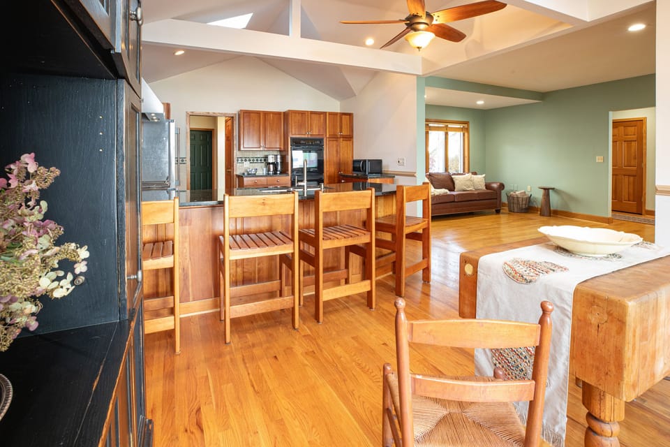Eat-in kitchen with an adjacent TV room
