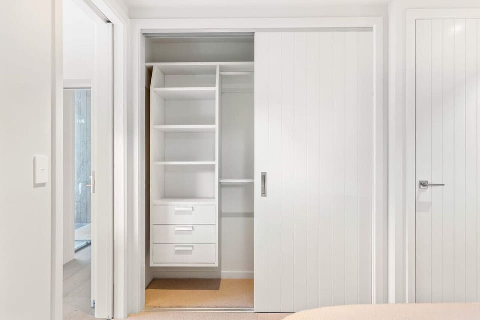 Generous wardrobe space for all your clothing needs.