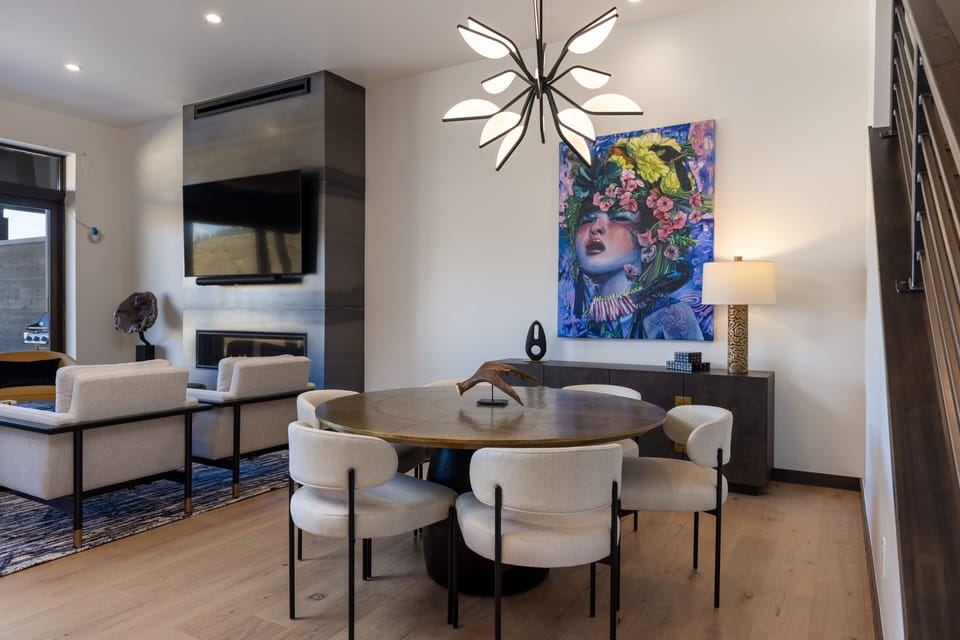 Dining table for 8 (additional chairs) and additional 5 seats at kitchen counter