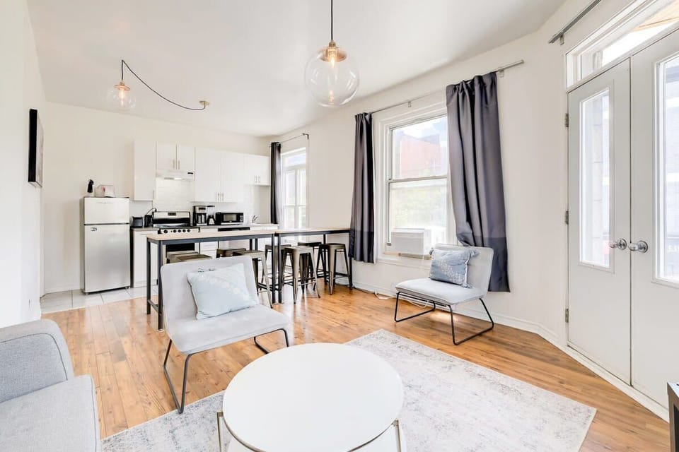 Hardwood flooring and lots of natural light during the day.