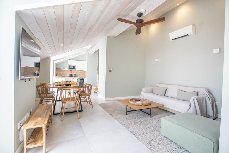 Exclusive Apartment, 1 Bedroom | Living area | Flat-screen TV
