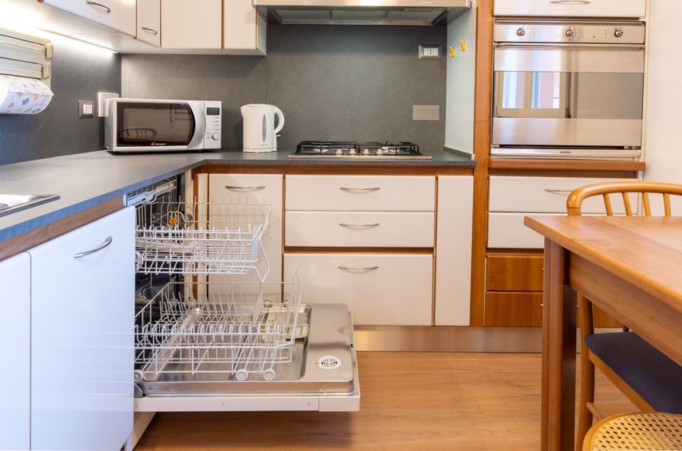 Apartment | Private kitchen | Full-size fridge, microwave, oven, stovetop