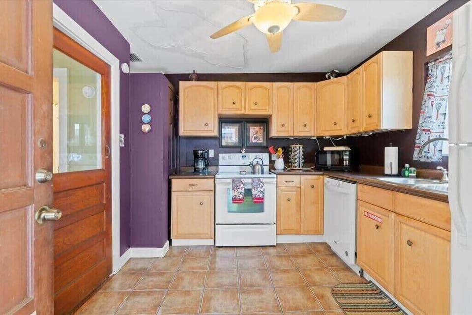 A fully-equipped kitchen, perfect for enjoying a meal at home.