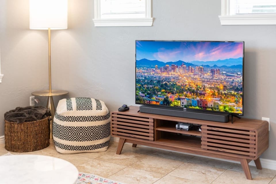The living room has a smart TV with soundbar. We've also installed an old school Nintendo so you can show your kids how it's done.