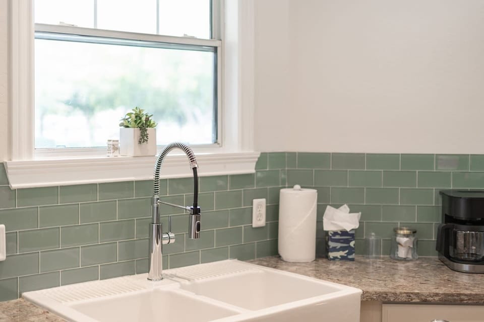 The modern farmhouse sink makes it a breeze to clean up.