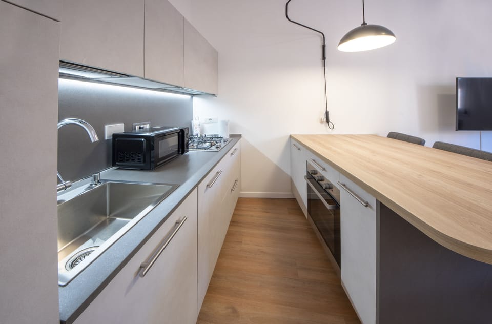 Apartment | Private kitchen | Full-size fridge, microwave, oven, stovetop