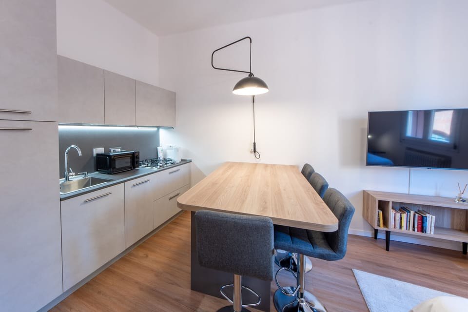 Apartment | Living area | 40-inch flat-screen TV with digital channels, streaming services