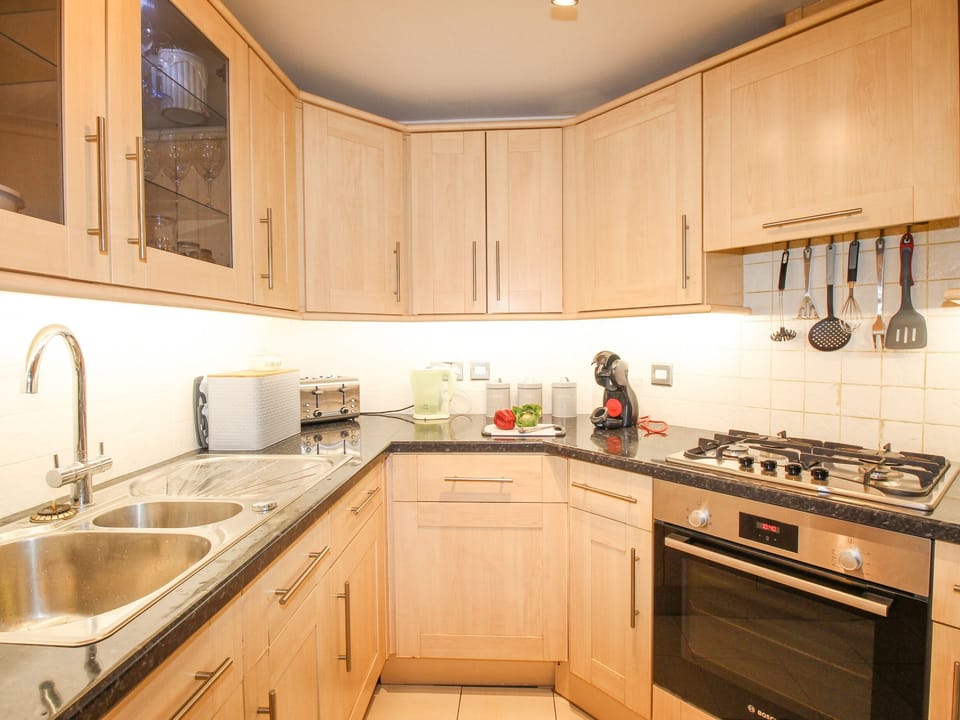 Fridge, electric kettle, toaster, cookware/dishes/utensils