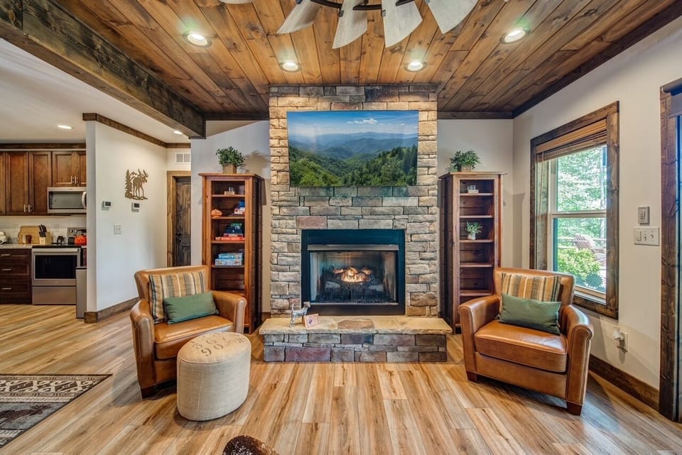 Living space w/ Mounted smart TV and Gas fireplace