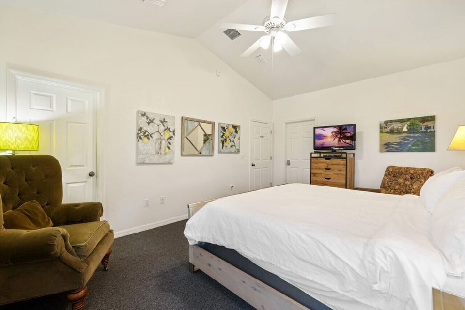 North unit bedroom with king bed and walkin closet
