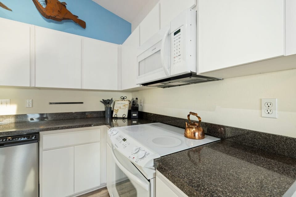North unit kitchen, lots of storage and plenty of cookware