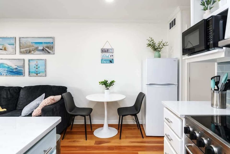 The apartment features an open-concept design that seamlessly integrates the kitchen.