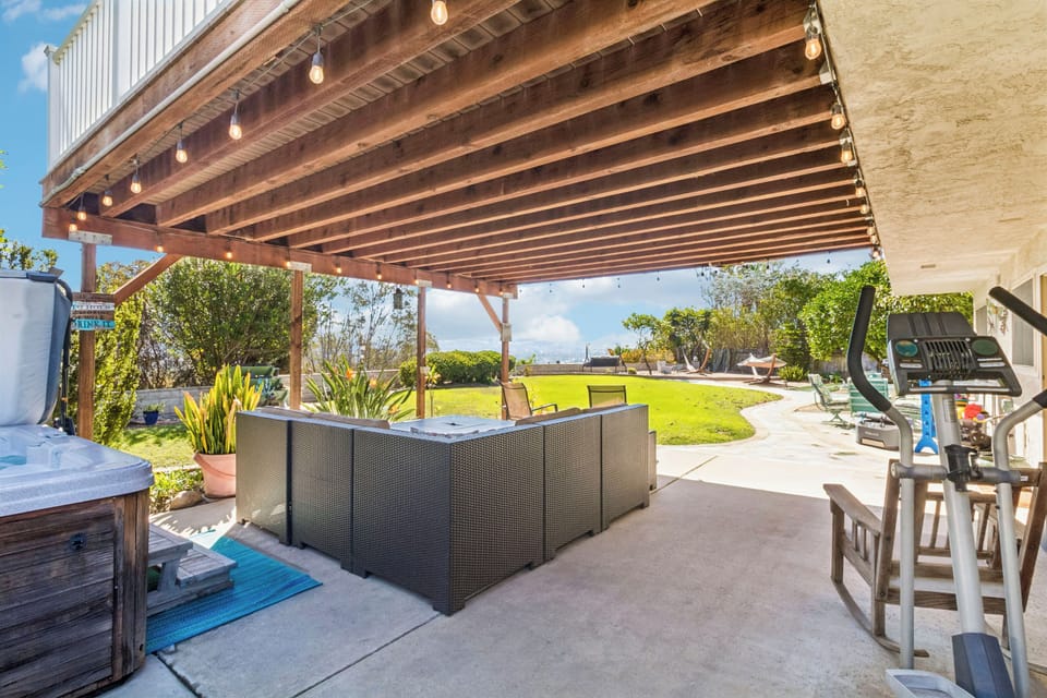 Sprawling grassy yard with room to roam