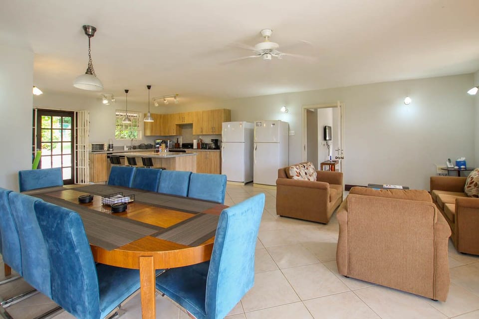 The verandah opens into the open plan living and kitchen area