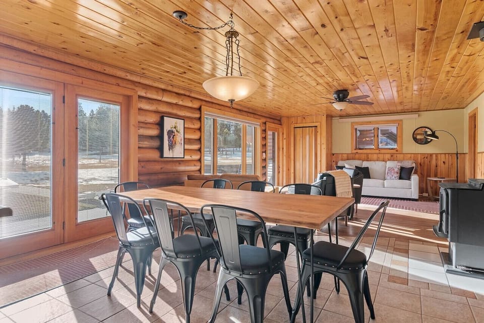 Dining area boasts a welcoming ambiance, perfect for enjoying meals with family and friends in a comfortable and inviting setting.