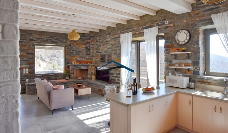 The seating area and the kitchen